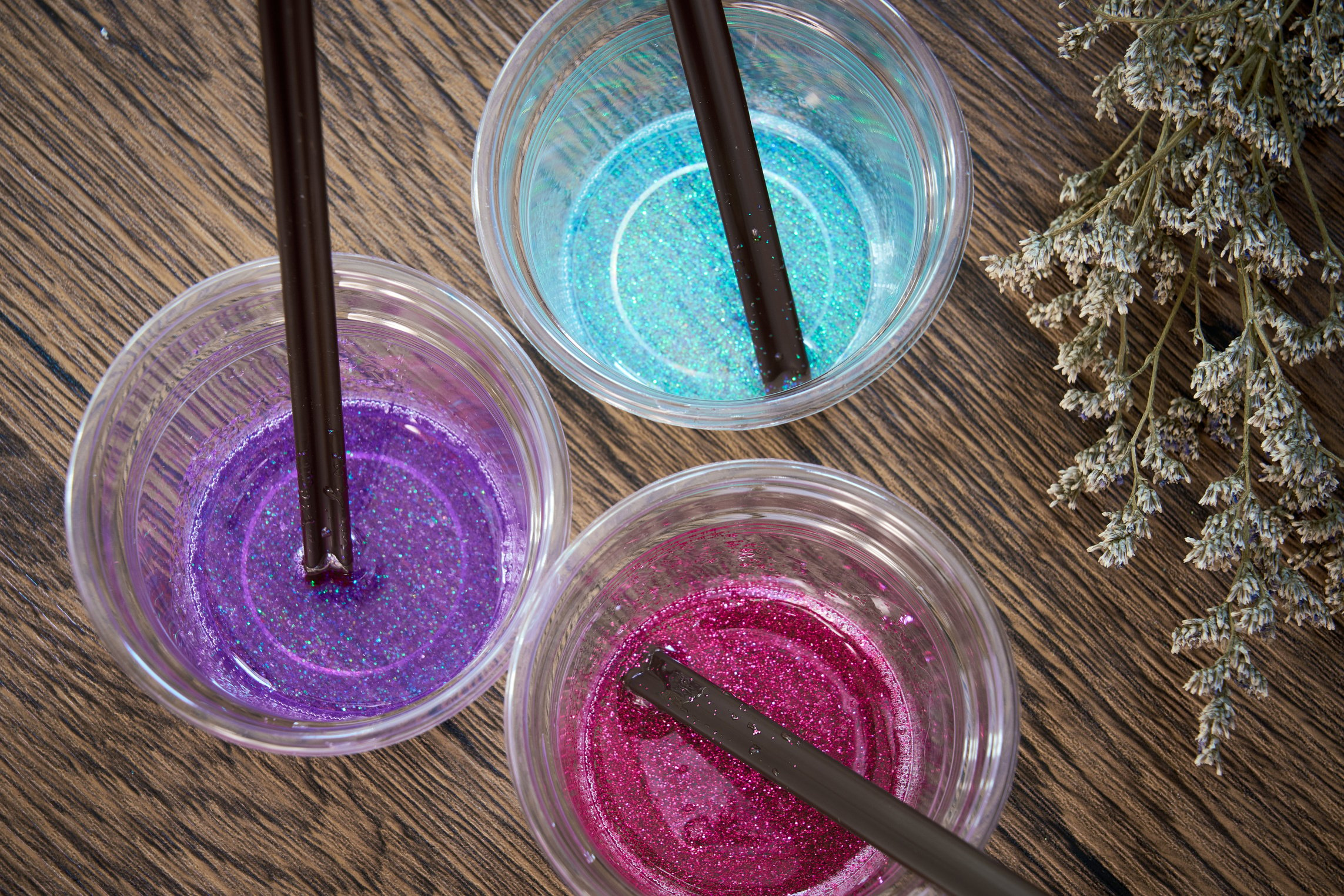 Colorful glitter resin in plastic cup